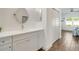 Bathroom featuring a vanity with lots of storage and with views into the bedroom at 6251 Cassia St, Bradenton, FL 34203