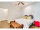 Bedroom with wood-look tile, bright natural light and closet at 6251 Cassia St, Bradenton, FL 34203