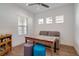 Office with bright light, wood-look tile and eclectic decor at 6251 Cassia St, Bradenton, FL 34203