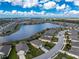 Aerial view of property showcasing the home's location in a lakeside community at 7049 Waterford Pkwy, Punta Gorda, FL 33950