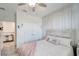 Cozy bedroom features a queen bed, a walk in closet and neutral colored decor at 11637 Woodleaf Dr # 11637, Bradenton, FL 34211