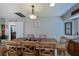 Dining area featuring wood table, bench seating, and neutral wall color at 1212 Yachtsman Ln, Punta Gorda, FL 33983