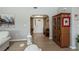 Inviting entryway with wood floors, a decorative cabinet, and a view leading into the living space at 1212 Yachtsman Ln, Punta Gorda, FL 33983