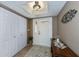 Bright foyer with light-colored flooring, a front door with window, and a decorative area rug at 1212 Yachtsman Ln, Punta Gorda, FL 33983