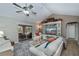 Inviting living room with vaulted ceiling, stylish furnishings, and a sliding glass door leading to the patio at 1212 Yachtsman Ln, Punta Gorda, FL 33983