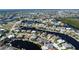 Aerial view of a waterfront community showcasing homes along canals, emphasizing the serene and luxurious lifestyle at 1259 Royal Tern Dr, Punta Gorda, FL 33950