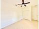 Comfortable bedroom featuring tiled flooring, a ceiling fan, and closet at 1259 Royal Tern Dr, Punta Gorda, FL 33950