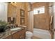 Bathroom featuring a granite countertop vanity and a shower-tub combination at 1620 Lancashire Dr, Venice, FL 34293