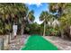 Community boat ramp offering convenient water access surrounded by lush vegetation at 17122 Barcrest Ln, Punta Gorda, FL 33955