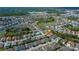 Aerial view of residential neighborhood with mature landscaping and well-maintained lawns at 1800 Birmingham Blvd, Punta Gorda, FL 33980