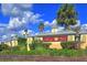 Kings Gate community entrance sign with lush tropical landscaping at 1800 Birmingham Blvd, Punta Gorda, FL 33980