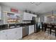 Well-lit kitchen with stainless steel appliances and granite countertops at 1800 Birmingham Blvd, Punta Gorda, FL 33980