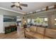 Inviting living room with a view of the screened lanai and modern decor at 1800 Birmingham Blvd, Punta Gorda, FL 33980