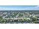 Scenic aerial view of homes with waterfront access and beautiful backyard docks at 18702 Van Nuys Cir, Port Charlotte, FL 33948