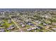 A neighborhood with single-Gathering homes surrounded by green spaces at 188 Cypress Nw Ave, Port Charlotte, FL 33952