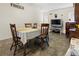 Inviting dining room featuring tile floors and a large table that provides ample space for entertaining at 188 Cypress Nw Ave, Port Charlotte, FL 33952