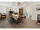 Inviting dining room featuring a ceiling fan, dining set, and decorative accents for a cozy atmosphere at 188 Cypress Nw Ave, Port Charlotte, FL 33952