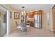 Well-lit kitchen featuring stainless steel appliances, granite countertops, tile flooring, and ample wooden cabinetry at 2284 Palm Tree Dr, Punta Gorda, FL 33950