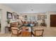 Comfortable living room featuring neutral colors, tile floors, and plenty of natural light at 2284 Palm Tree Dr, Punta Gorda, FL 33950