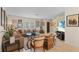 Comfortable living room featuring neutral colors, tile floors, and plenty of natural light at 2284 Palm Tree Dr, Punta Gorda, FL 33950