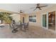 Inviting covered patio featuring ceiling fans and comfortable seating, perfect for outdoor relaxation at 2284 Palm Tree Dr, Punta Gorda, FL 33950