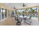 Stunning covered patio with views of the pool and waterfront, ideal for entertaining or relaxing at 2284 Palm Tree Dr, Punta Gorda, FL 33950