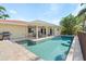 Private pool with a covered patio for outdoor entertaining and relaxing at 2284 Palm Tree Dr, Punta Gorda, FL 33950