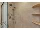 Shower features a hand held sprayer, overhead sprayer and built in storage shelves at 2284 Palm Tree Dr, Punta Gorda, FL 33950