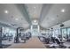 Well-equipped community gym with high ceilings, ceiling fans, and many machines for cardio and weightlifting at 2478 Brassica Dr, North Port, FL 34289