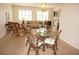 Bright and airy living room showcasing tile floors, a glass dining table, and comfortable furnishings at 255 West End Dr # 1302, Punta Gorda, FL 33950