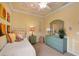 Bright bedroom with colorful wall decor and unique ceiling detail at 2639 Hobblebrush Dr, North Port, FL 34289