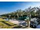 Private boat dock on the canal offers a convenient lift and picturesque waterfront for relaxing and boating at 27385 Neaptide Dr, Punta Gorda, FL 33983