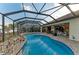 Screened pool with patio and lounge area at 349 Springview Nw Cir, Port Charlotte, FL 33948