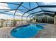 A screened pool has beautiful water views at 349 Springview Nw Cir, Port Charlotte, FL 33948