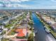 Beautiful waterfront property boasting direct water access, a private dock, and swimming pool at 35 Sabal Dr, Punta Gorda, FL 33950