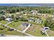 Aerial photo showcasing a residential house and detached garage in a picturesque residential area at 3714 Gulfbreeze Ln, Punta Gorda, FL 33950