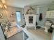 Stylish bathroom featuring double sinks, a decorative cabinet, and elegant fixtures at 3714 Gulfbreeze Ln, Punta Gorda, FL 33950