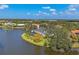 An aerial view of the home highlighting its location on the waterfront at 4 Saint Martin Cir, Englewood, FL 34223