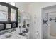 Bathroom featuring tiled shower with a starfish curtain and decor at 4383 Mckibben Dr, North Port, FL 34287