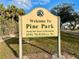 Welcome to Pine Park sign for the North Port Parks & Recreation at 4556 McKibben Dr. in North Port, Florida at 4383 Mckibben Dr, North Port, FL 34287