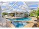 Back patio with in-ground pool and spa at 5196 Early Ter, Port Charlotte, FL 33981