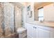 Bathroom featuring a shower and tub combo and white vanity with sink at 8029 Roy Dr, Punta Gorda, FL 33982