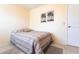 Bedroom displaying a bed, neutral walls, and tiled flooring at 8029 Roy Dr, Punta Gorda, FL 33982