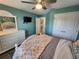 Comfortable bedroom with a bed, dresser, and large double door closet for ample storage at 9175 Melody Cir, Port Charlotte, FL 33981