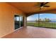 Screened lanai featuring beautiful water views and a ceiling fan for outdoor comfort at 93 Vivante Blvd # 9336, Punta Gorda, FL 33950