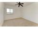 Bedroom with carpet, ceiling fan and a single window at 93 Vivante Blvd # 9336, Punta Gorda, FL 33950