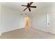 Bedroom with ceiling fan, carpet, and closet at 93 Vivante Blvd # 9336, Punta Gorda, FL 33950