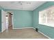 Bedroom featuring luxury vinyl floors, neutral paint, and a fan at 9428 Bandera Ln, Port Charlotte, FL 33981