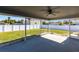 Back yard featuring screened-in lanai area at 11176 3Rd Ave, Punta Gorda, FL 33955