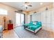 Comfortable bedroom featuring stylish decor, sliding glass door and a unique, space-saving Murphy bed at 11723 1St E St, Treasure Island, FL 33706